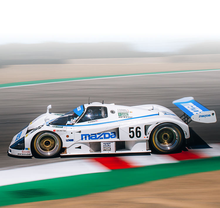Mazda 787 Driving on a Racetrack