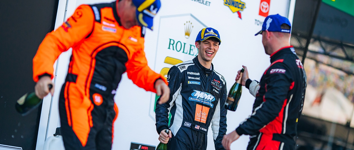 Mazda Racer Receiving Champagne at the Podium