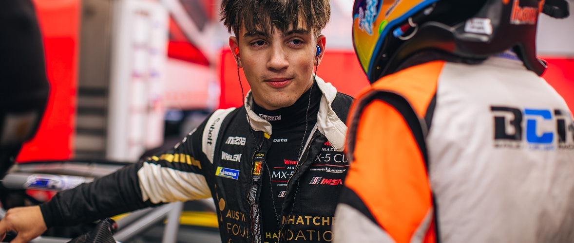 Mazda Racer Talking With Another Driver