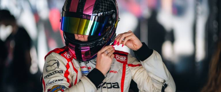 Mazda MX-5 Cup Racer Putting on Helmet