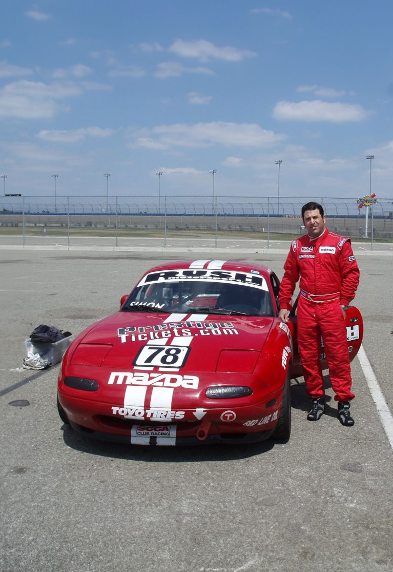 Marc Simon with Mazda Race Car