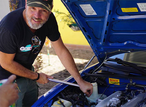 Pete Royea with Open Hood of His Mzda MX-5 Miata
