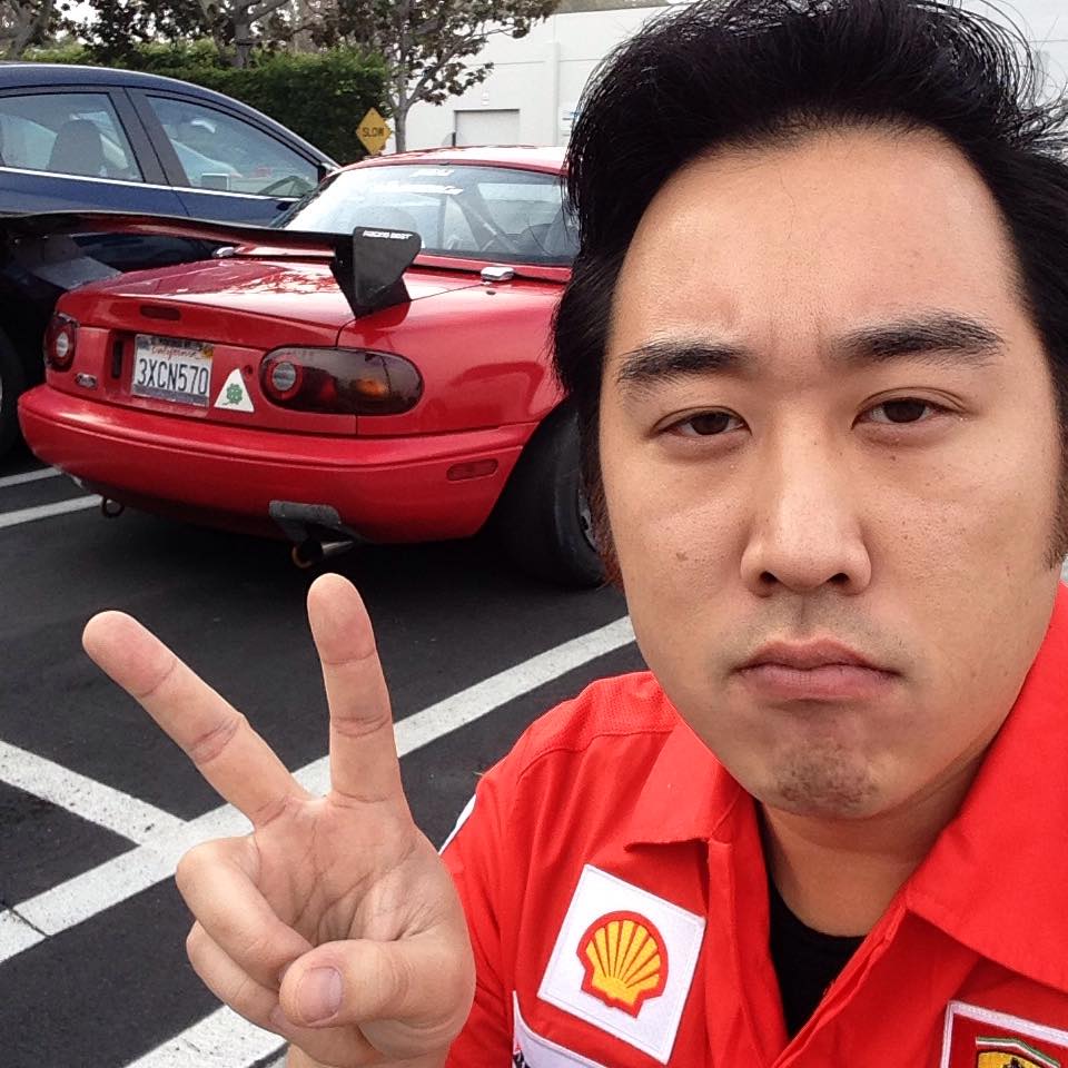Daniel Lim Driving with Red Mazda MX-5 Miata Behind Him