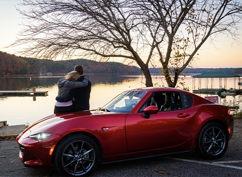 Melanie Wheeler by Red Mazda MX-5 Miata