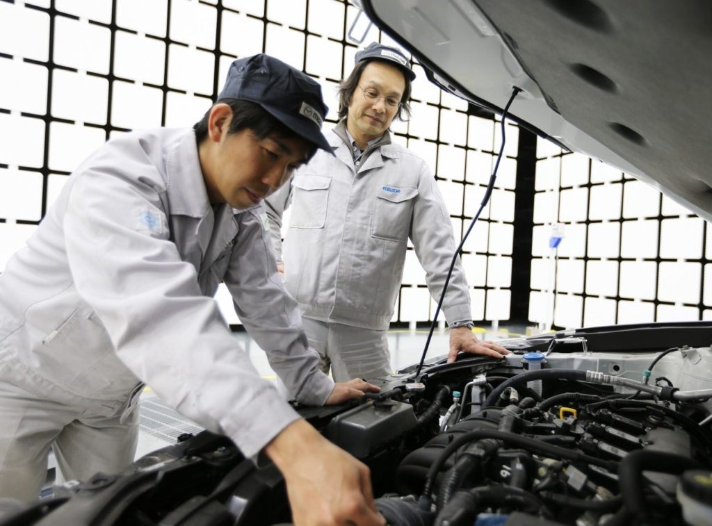 Mazda Engineers in the Electromagnetic Laboratory