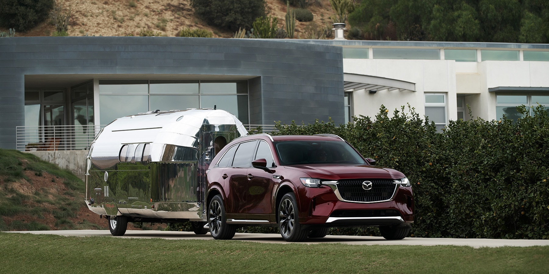 Driving Modes Explained: A Guide – Mazda CX-90 Towing a Camper Trailer