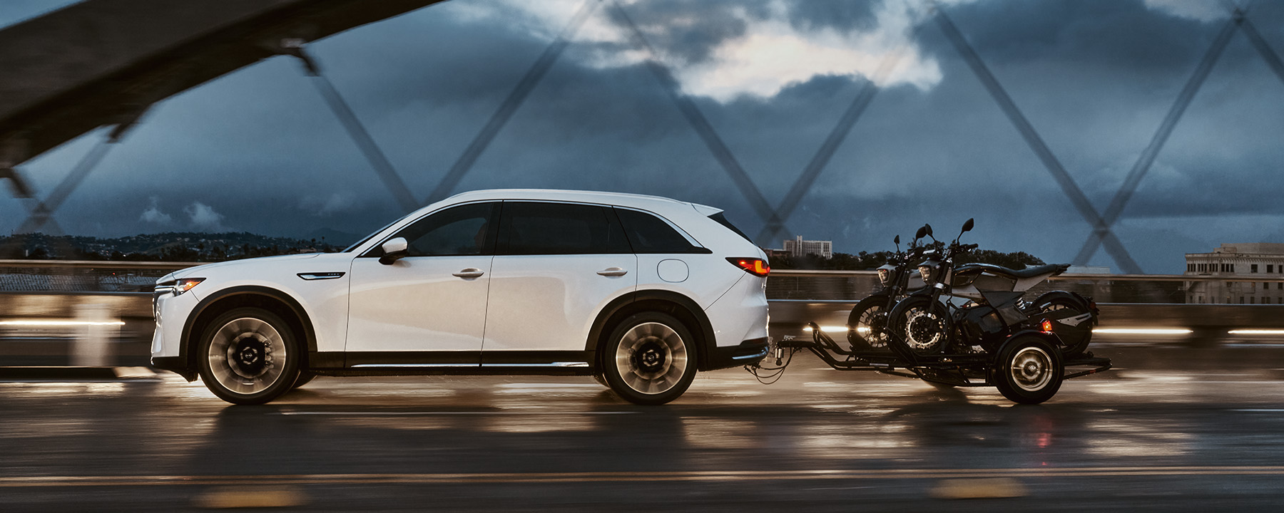 Mazda CX-90 PHEV Towing Bikes on a Bridge